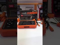 Xtruck M1 मोटरसाइकिल डायग्नोस्टिक टूल जिसमें 12 भाषाओं का समर्थन, 120+ विशेष कार्य और 1 वर्ष की वारंटी है